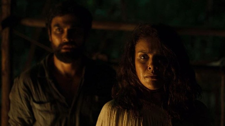 Lúcia and Mateus looking worried