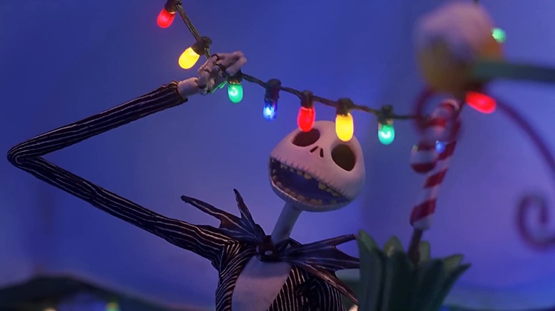 Jack Skellington putting up Christmas lights