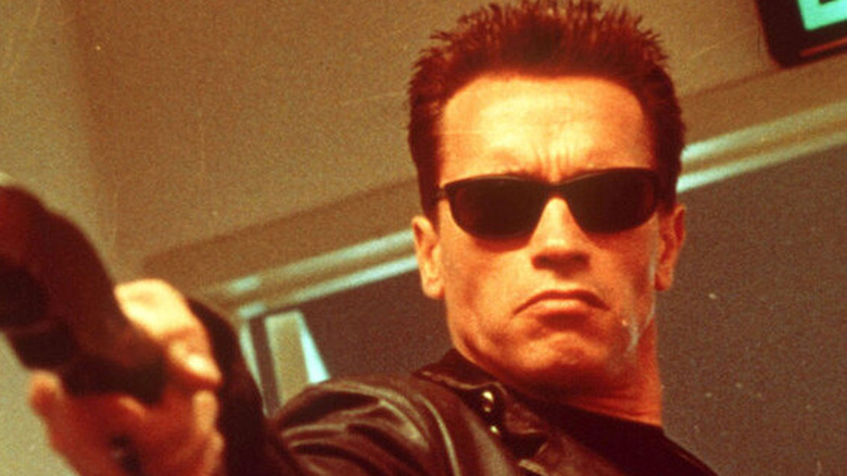 Arnold Schwarzenegger pointing gun