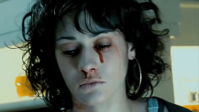 Lizzy Caplan bleeding from her eye and nose