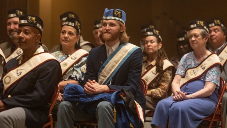 Wyatt Russell wears a hat on Lodge 49