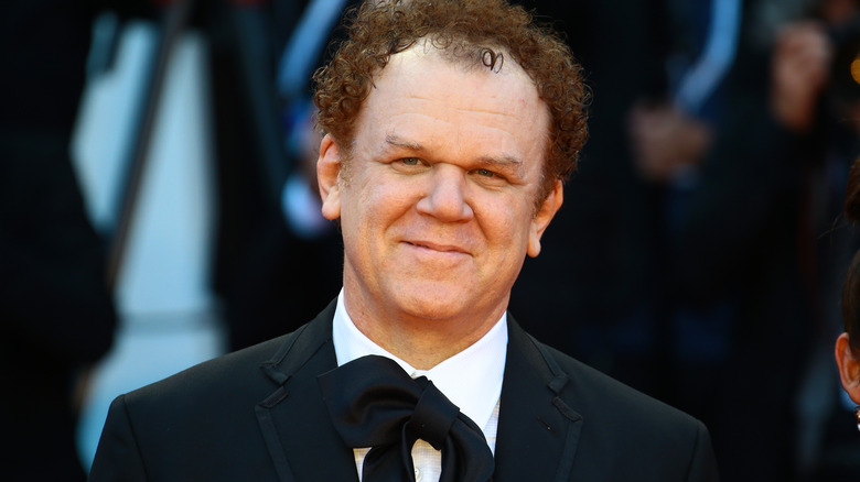 John C. Reilly posing