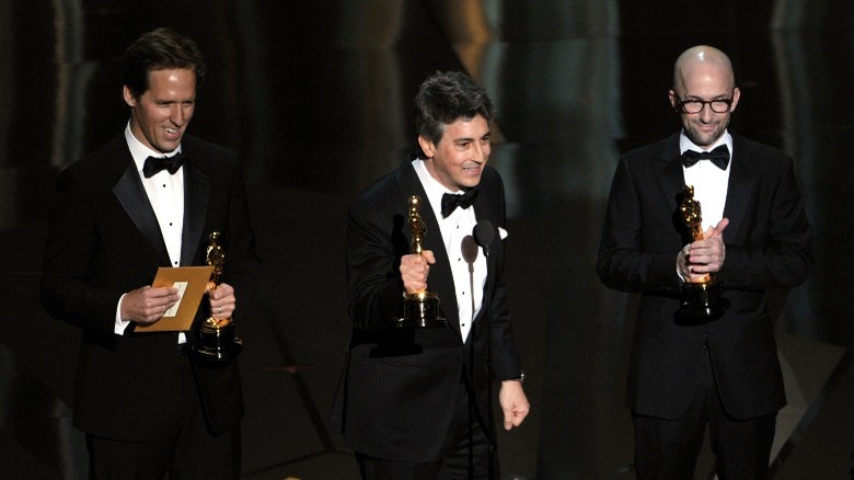 Nat Faxon, Alexander Payne, and Jim Rash accept their Oscar