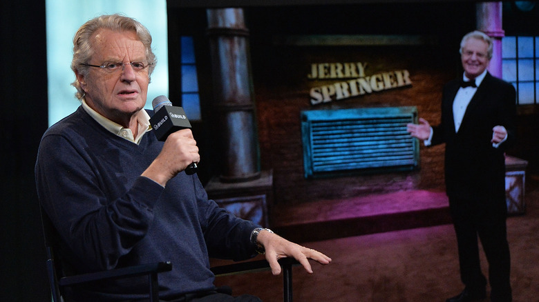 Jerry Springer with a microphone