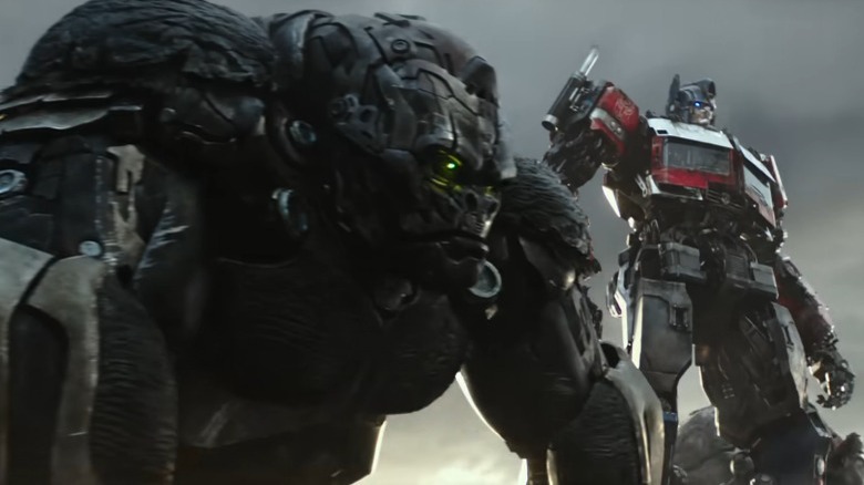 Optimus Prime and Optimus Primal standing together