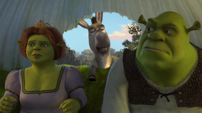 Fiona, Donkey, and Shrek in a carriage