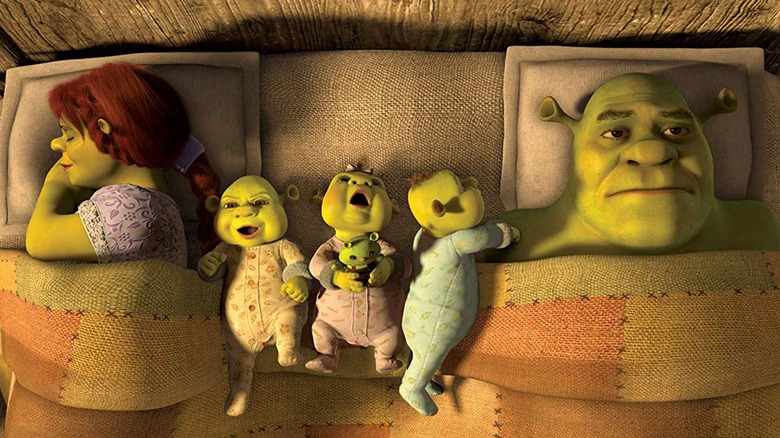 Fiona, Shrek, and their triplets in bed