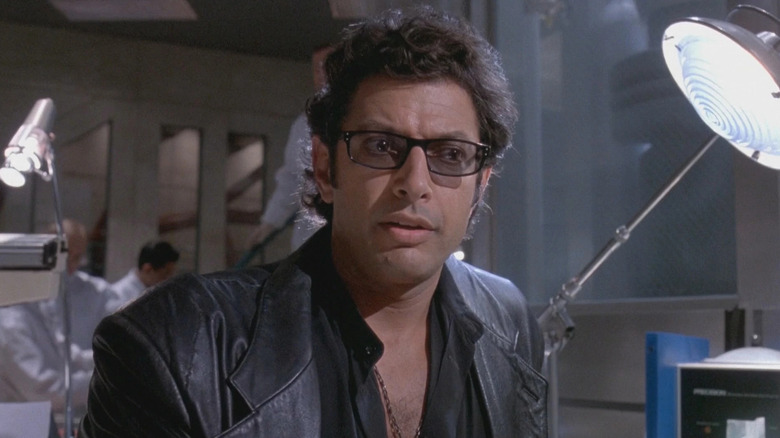 Ian Malcolm in leather jacket speaks