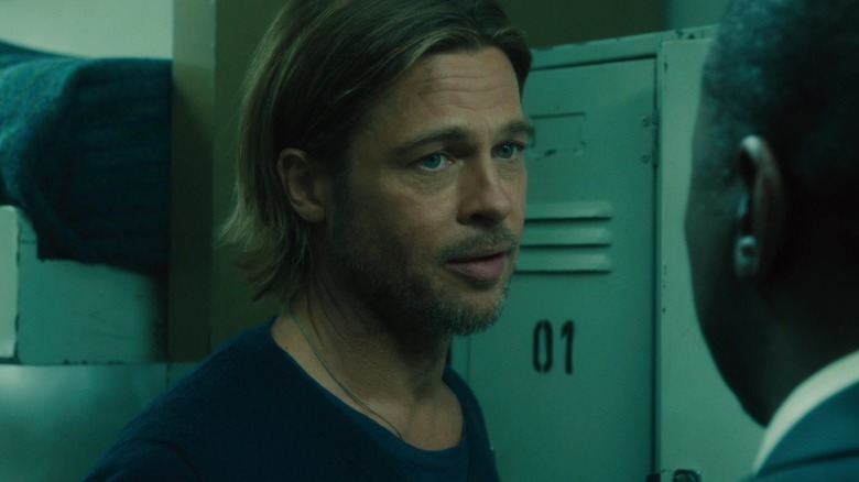 Brad Pitt listening intently