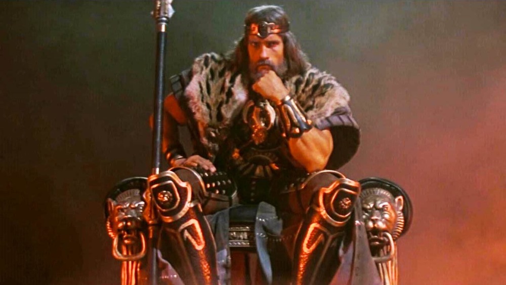 Conan the Barbarian sits on a throne