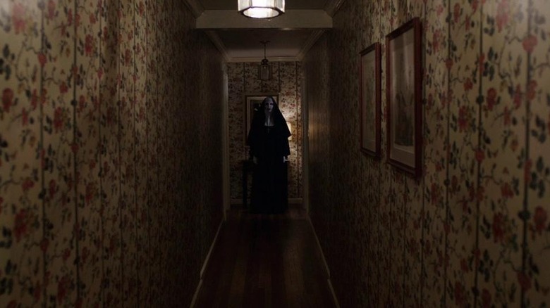 Nun in hallway