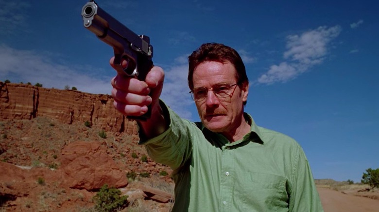 Walt points gun 