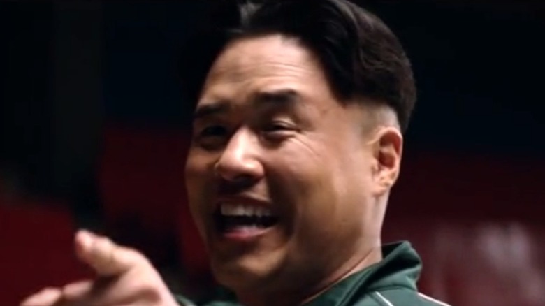 Kim Jong-un pointing and laughing