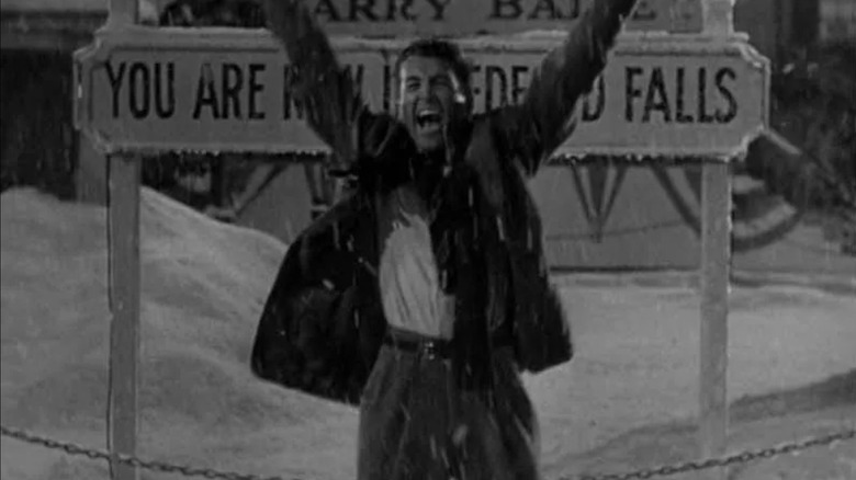 George Bailey cheers in the snow