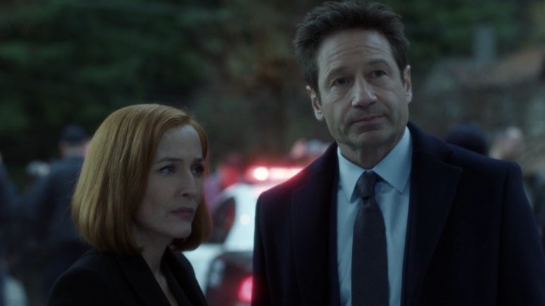 Mulder and Scully working a case on The X-Files 