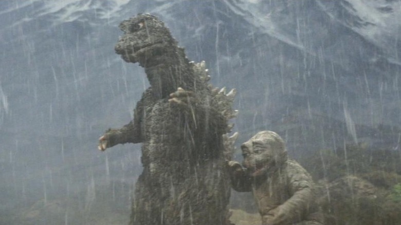 Godzilla and son in the rain