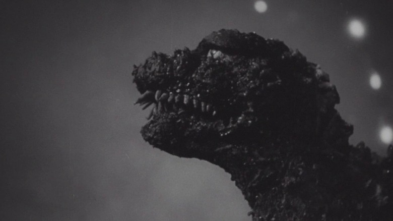 Godzilla snarling at the sky