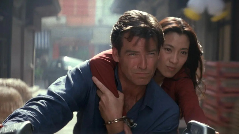 Bond and Wai Lin on motorcycle