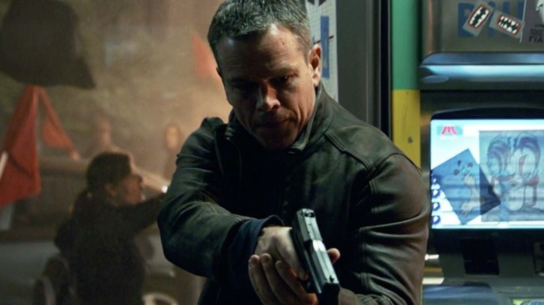 Jason Bourne with gun