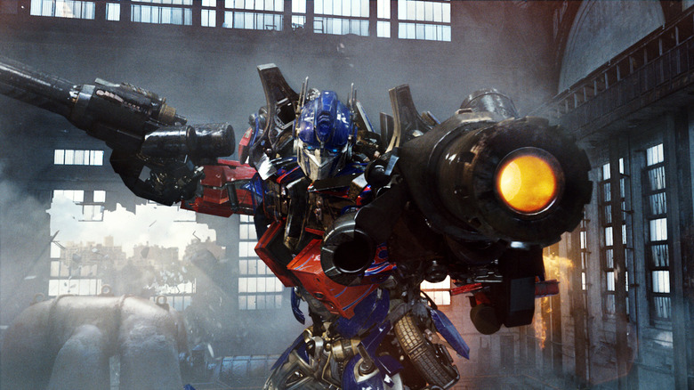 Optimus Prime shooting his gun