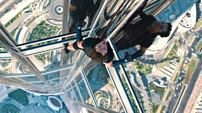 Ethan Hunt scaling a building