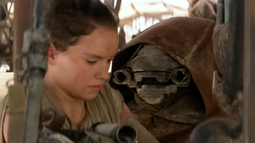 Scrapjaw Motito and Rey in Star Wars: The Force Awakens 