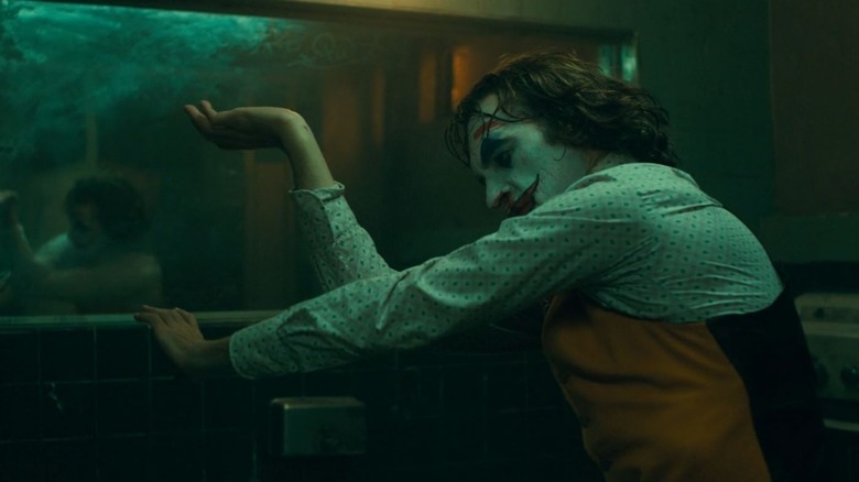 Joaquin Phoenix dancing in bathroom