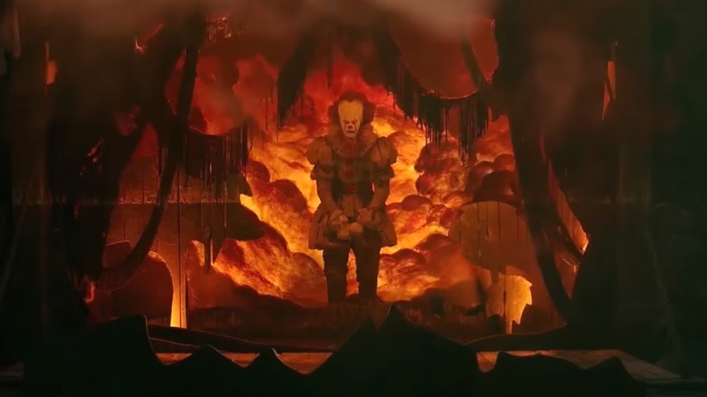 Pennywise the Dancing Clown in orange and red lair