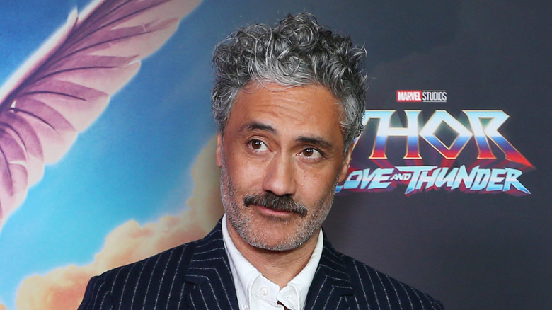 Taika Waititi raising his eyebrows