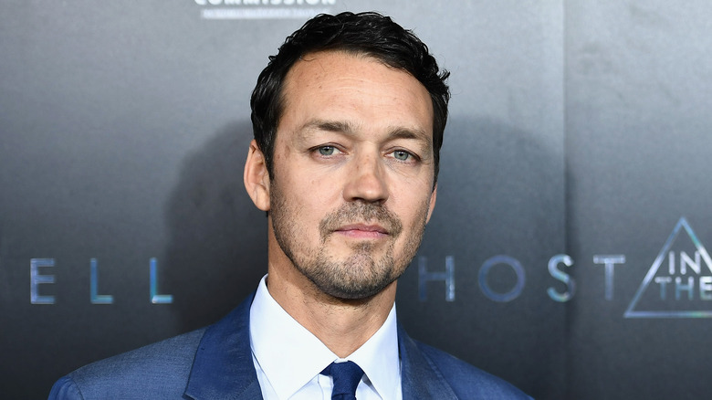 Rupert Sanders wearing blue suit