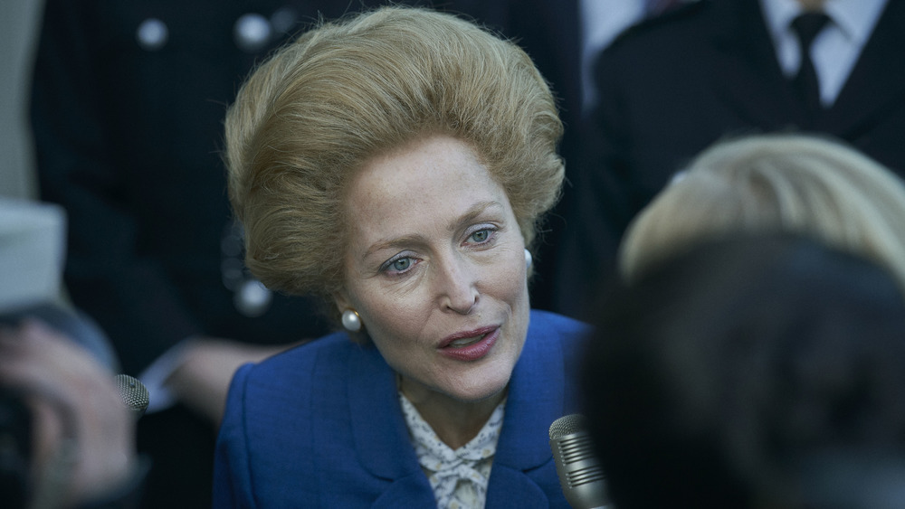 Margaret Thatcher (Gillian Anderson) talks to the press on The Crown