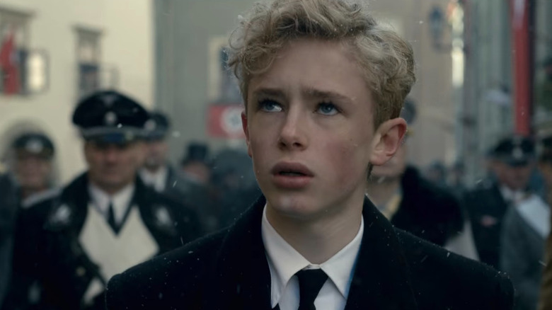 Young Philip at Cecile's funeral in The Crown