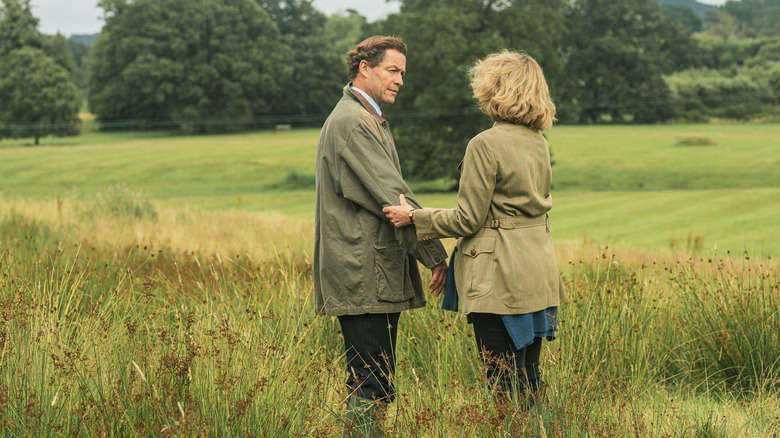 Charles and Camilla in a field 