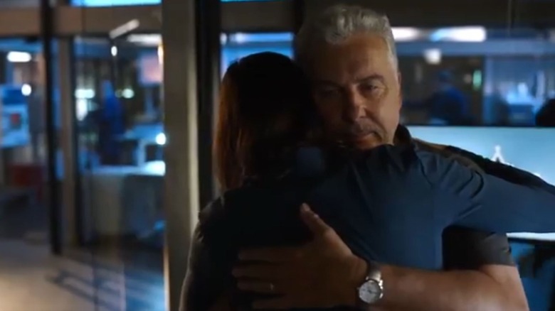 Gil Grissom and Sara Sidle hugging