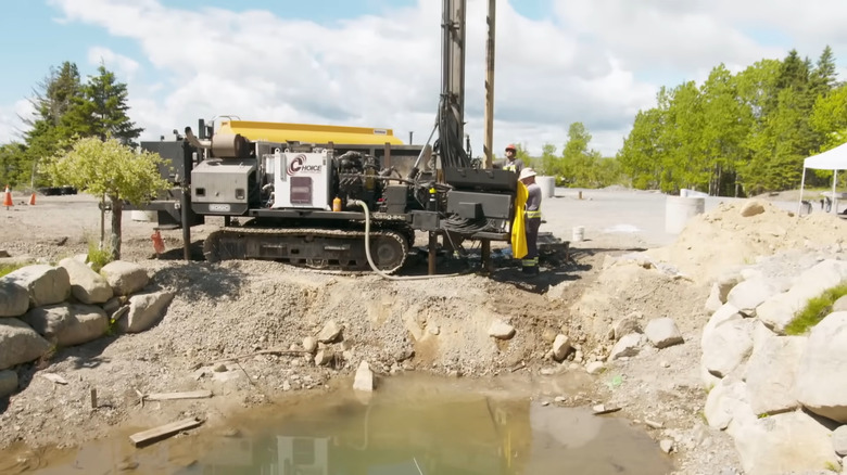 sonic drill in muddy area