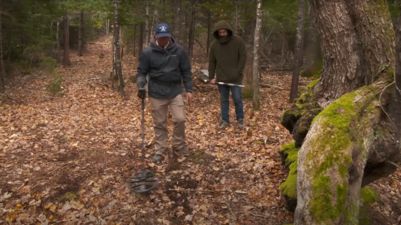 Gary Drayton using his metal detector in The Curse of Oak Island