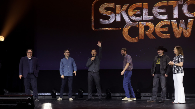 Jon Favreau, Christopher Ford, Jude Law, Jon Watts, Dave Filoni, and Kathleen Kennedy speak onstage