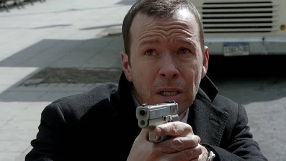 Donnie Wahlberg as Danny Reagan holds his gun left-handed in Blue Bloods