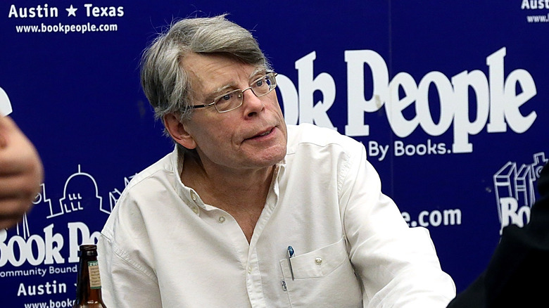 Stephen King signing books at meet and greet