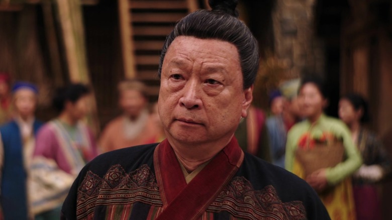 Mulan's father looks serious