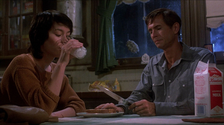 Meg Tilly and Anthony Perkins in Psycho 2