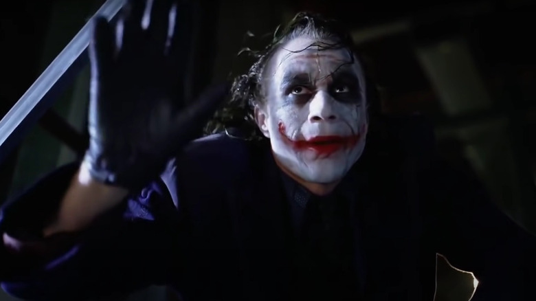 Joker reaching in The Dark Knight