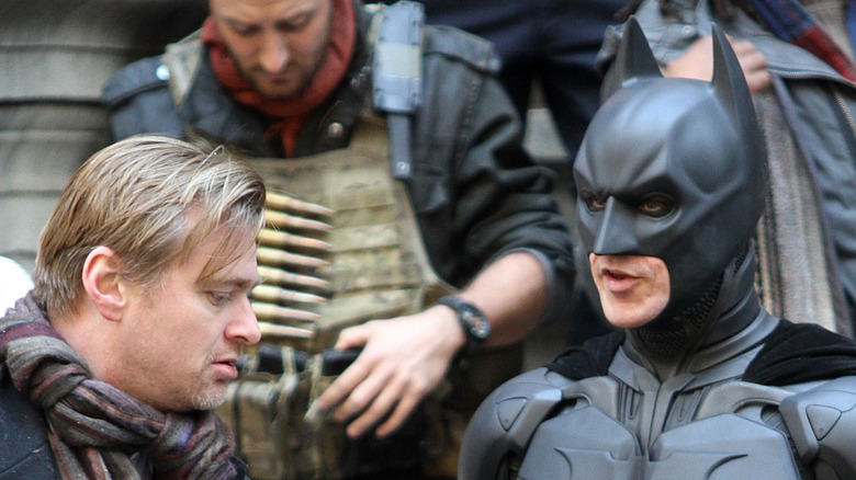 Christopher Nolan directing Christian Bale on set