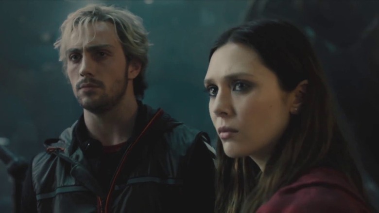 Pietro and Wanda listen suspiciously