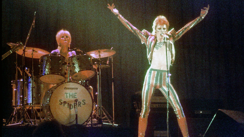 David Bowie performing as Ziggy Stardust