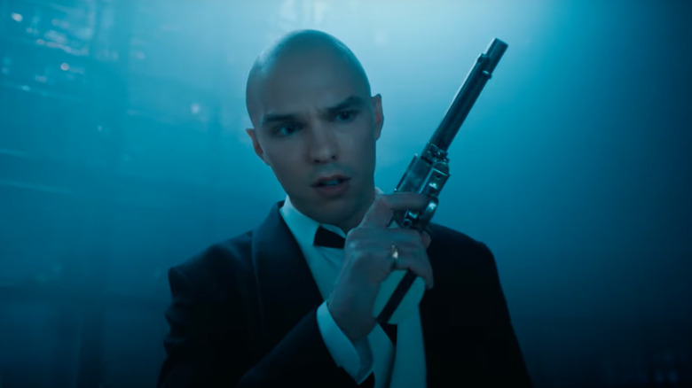 Lex Luthor holding a weapon in the Superman trailer