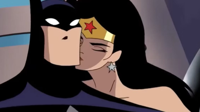 Wonder Woman kisses Batman