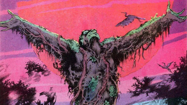 Swamp Thing spreading his hands