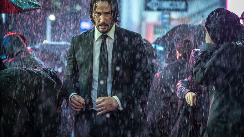 John Wick walking in rain