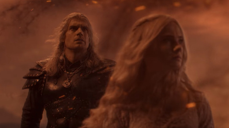 Ciri and Geralt standing together